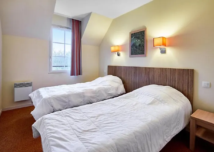 Hotel apartamentowy Pierre & Le Port-en-Bessin-Huppain